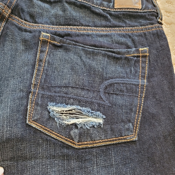 AMERICAN EAGLE Distressed Dark Wash Peek A Boo American Flag Pocket Jean Shorts - Picture 9 of 9